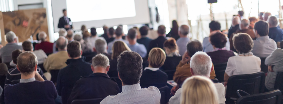 A group of people participating in a conference