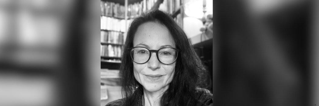 Black and white image of Professor Mariann Hardey looking straight to camera