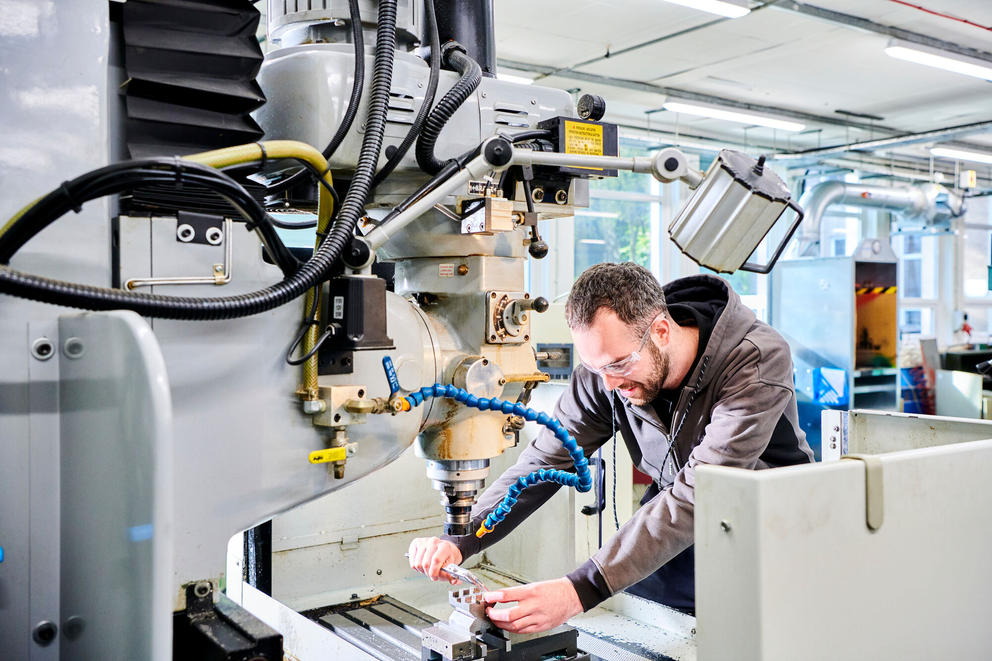 Technician working at a machine