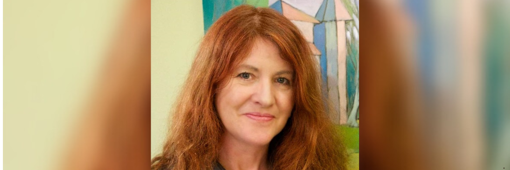 Professor Fuschia Sirois smiling to camera