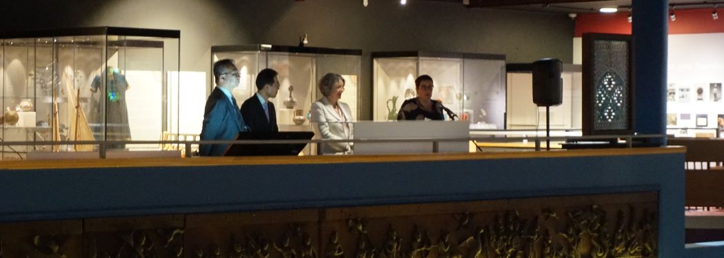 Japanese guests from the Natioanal Museum of Japanese History and Culture Ambassador with Vice-Chancellor adn Rachel Barclay Curator of the Oriental Museum, standing in the gallery, opening the exhibition 'Hands of friendship' November 2025. Memorandum of Understanding