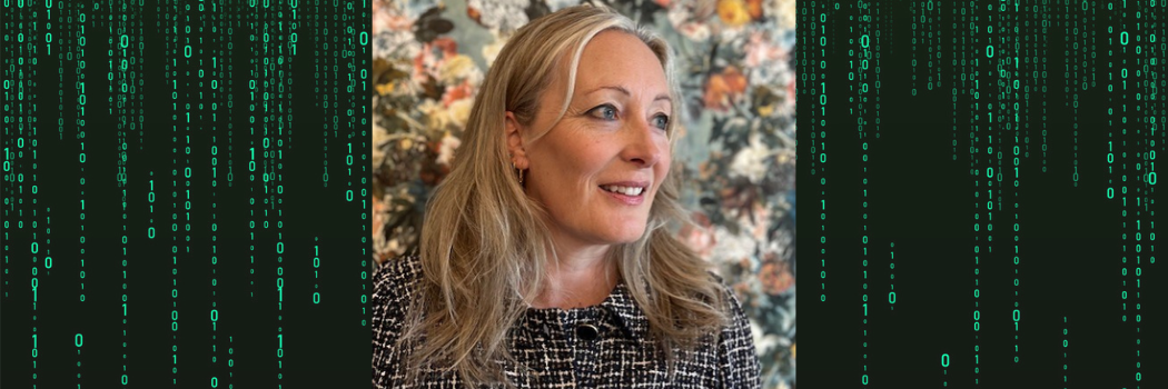 Professor Louise Amoore wearing a black and white top smiling with a green code background