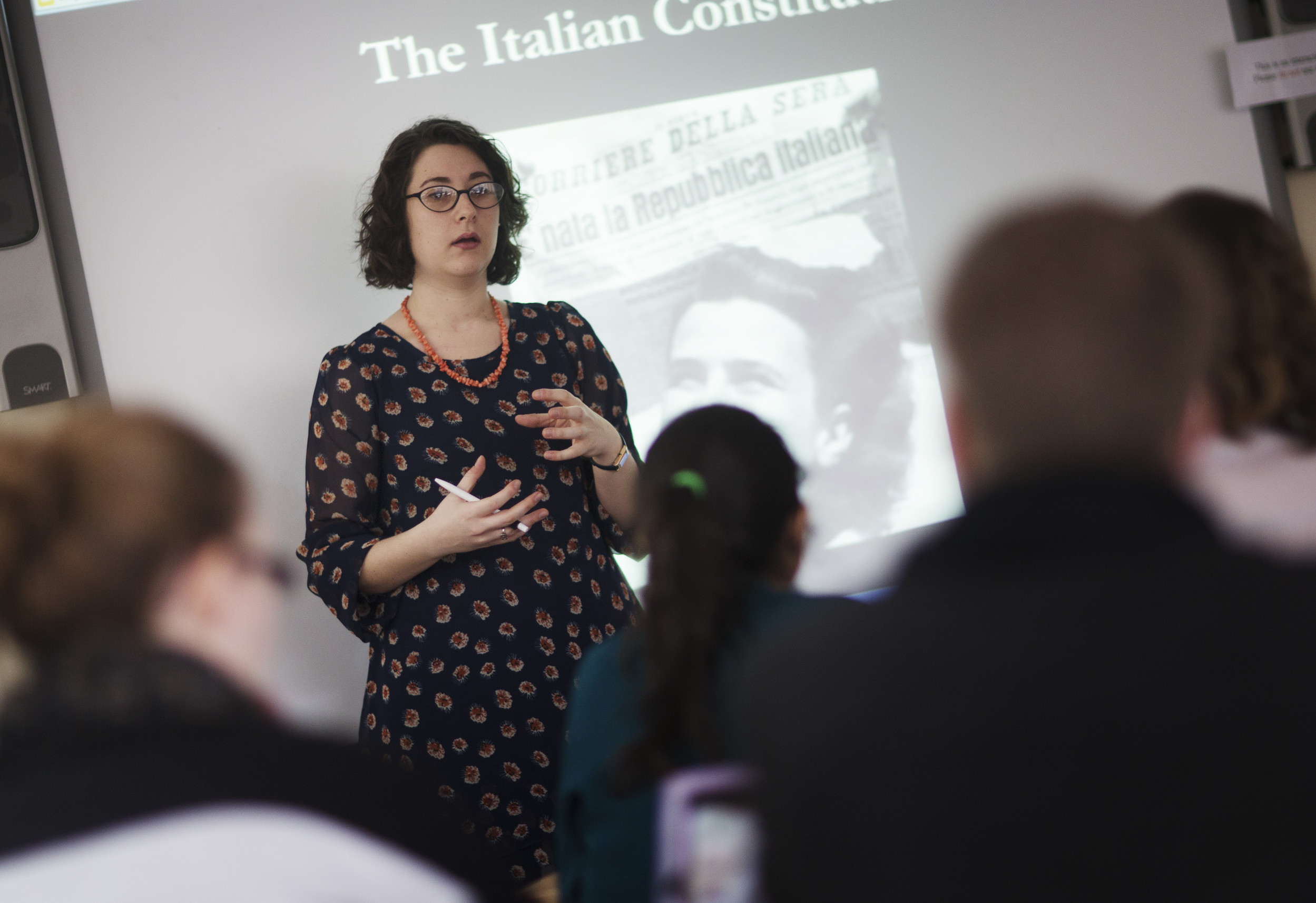 Lecturer doing a presentation to an audience