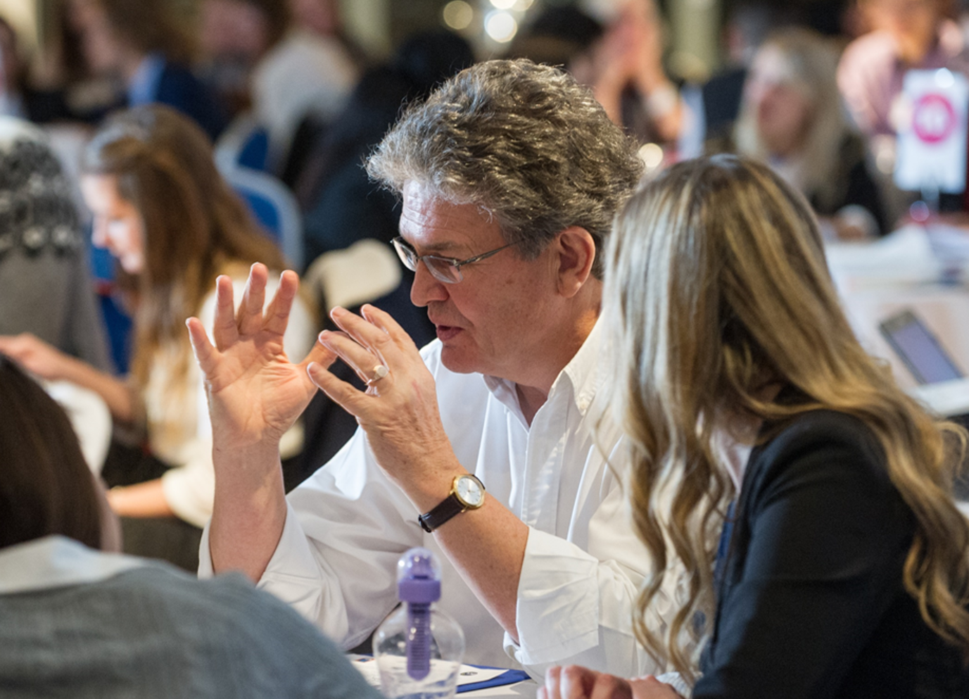 Business adviser at a table giving advice