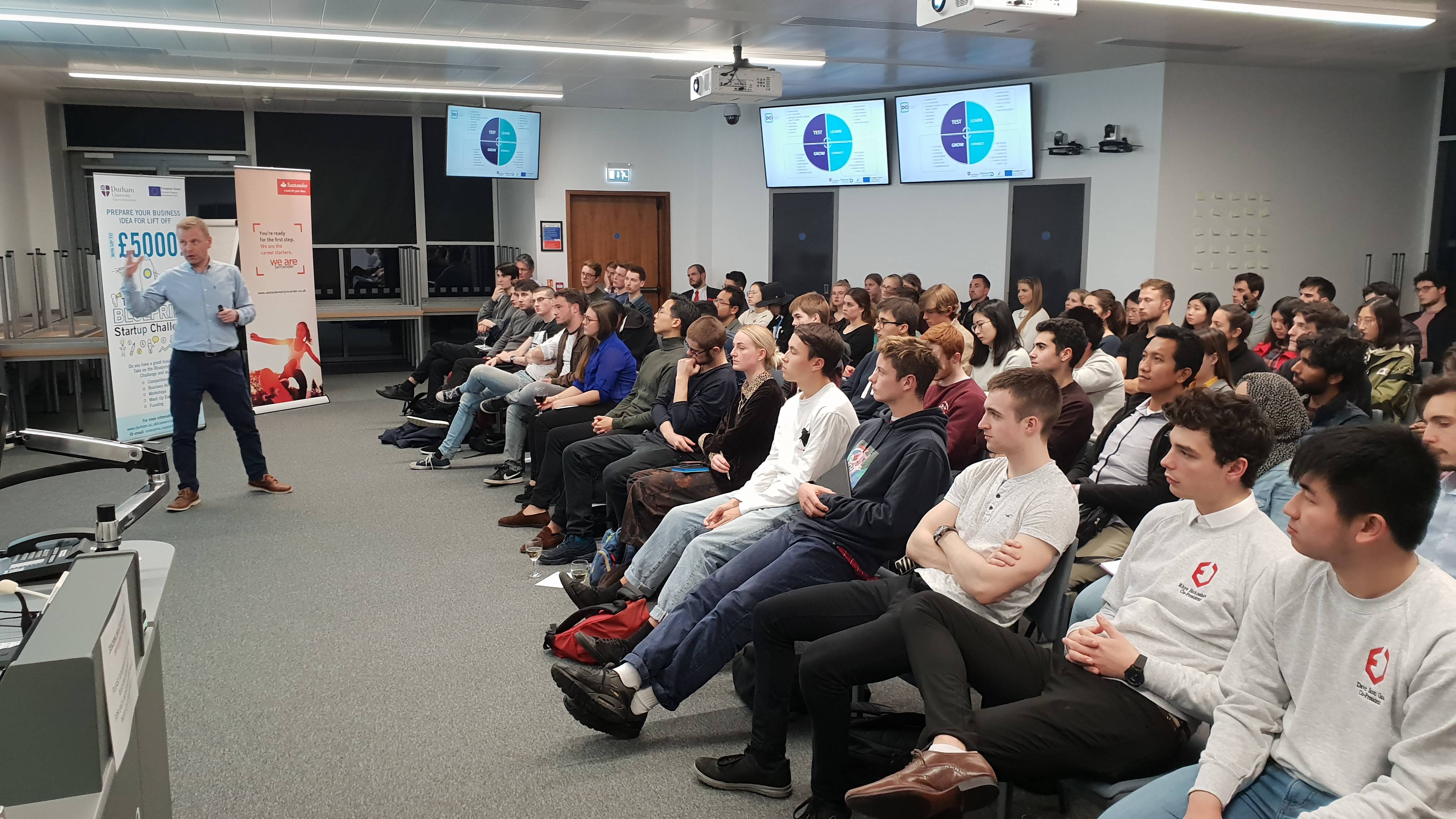 Students watching a presentation