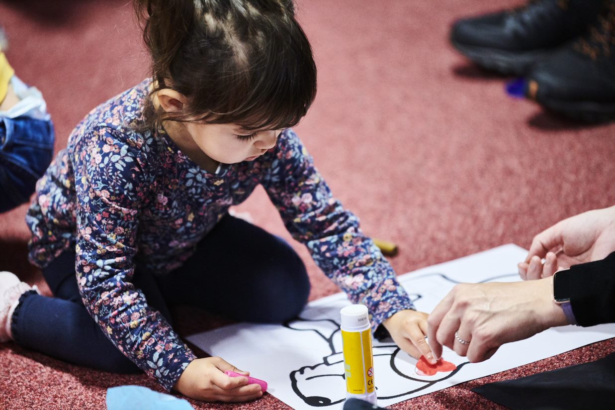 A child colouring in a picture