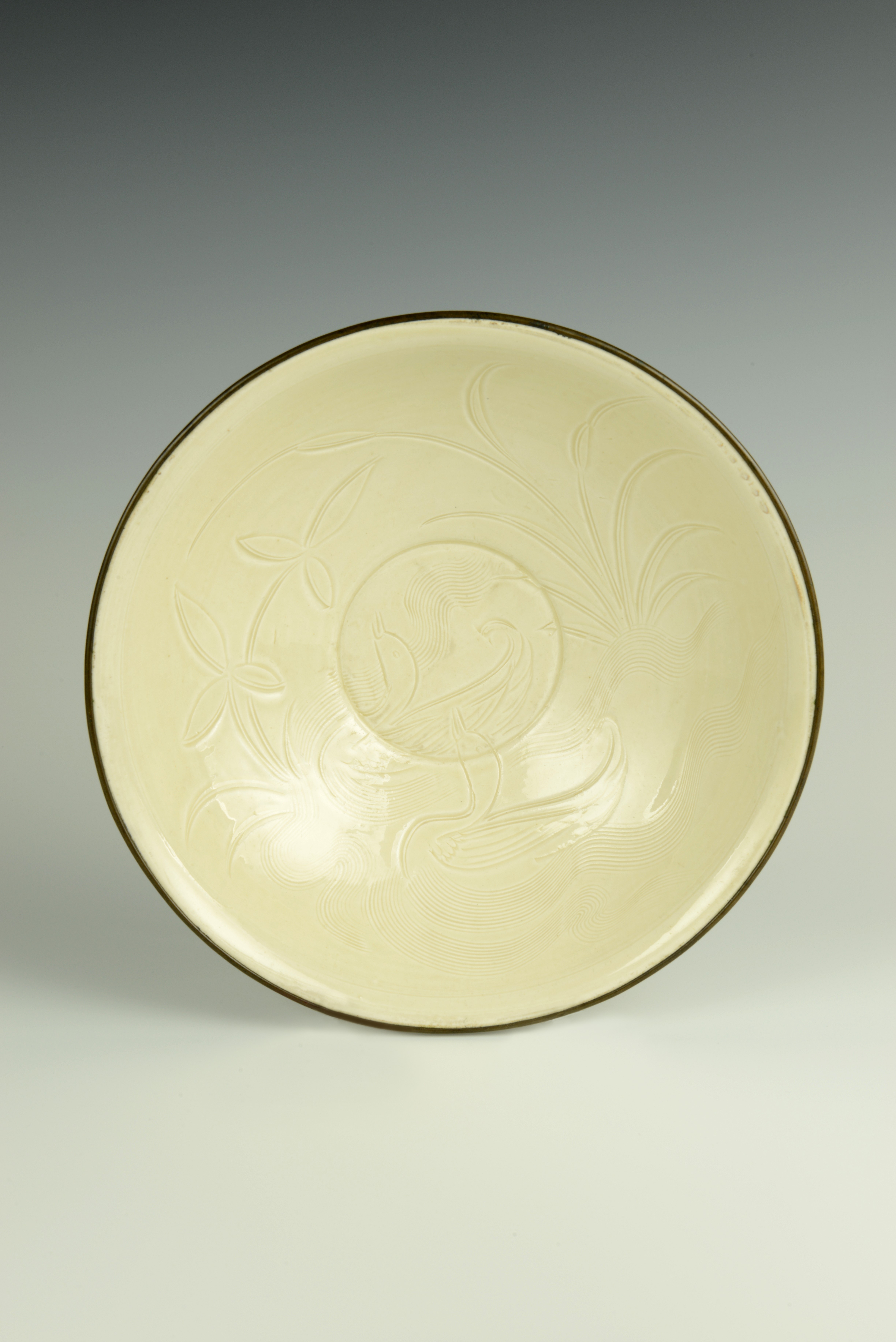 Song dynasty ding ware bowl with ducks
